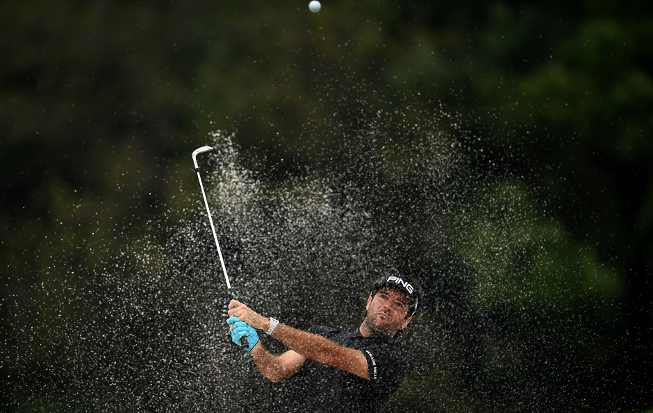 Bubba Watson of the US plays a bunker shot at the World Golf Championships-HSBC Champions golf tournament in Shanghai. PHOTO: AFP