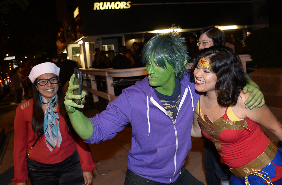 People gather along M Street NW in Georgetown for Halloween celebrations in Washington. PHOTO: AFP