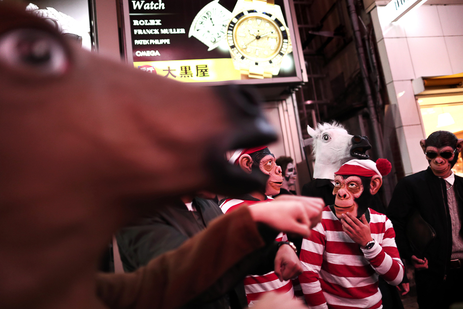 This photo shows people in costumes gesturing as they take part in a Halloween parade in Tokyo. PHOTO: AFP
