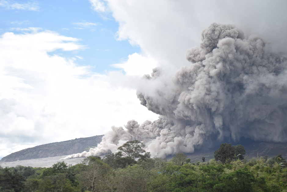 Mount Sinabung on Sumatra Island is seen from Karo unleashing gas and fine rock as it erupts again. PHOTO: AFP