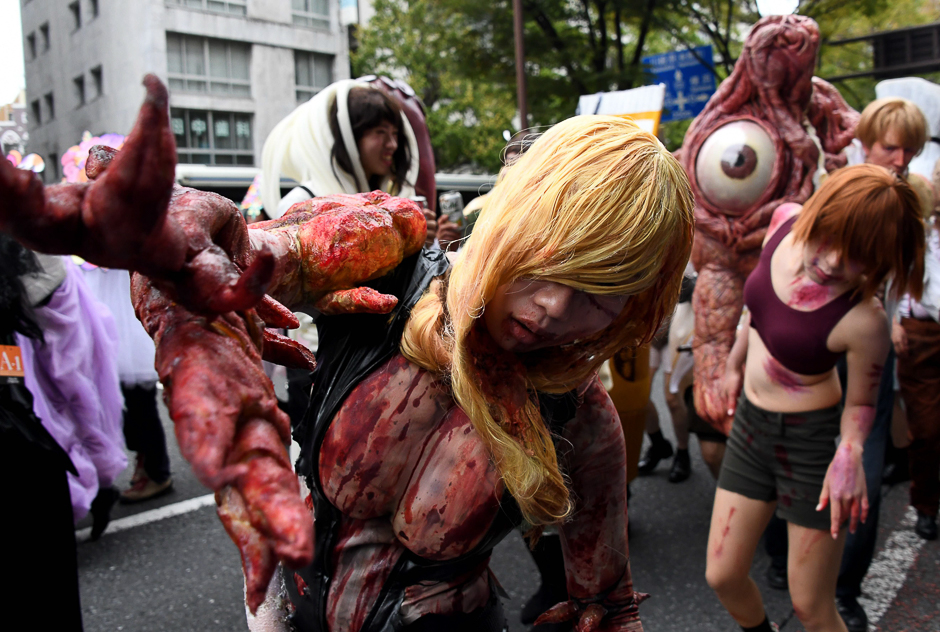 Wearing costumes, participants join the Kawasaki Halloween parade in Kawasaki on October 30. PHOTO: AFP