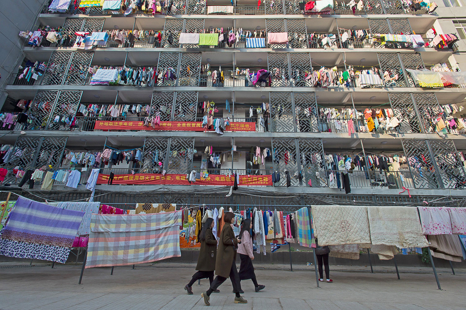 The picture shows laundry and bedding hanging out to dry at the women's dormitory of the Hubei traditional Chinese medicine university's Hualin campus in Wuhan in China's central Hubei province. PHOTO: AFP