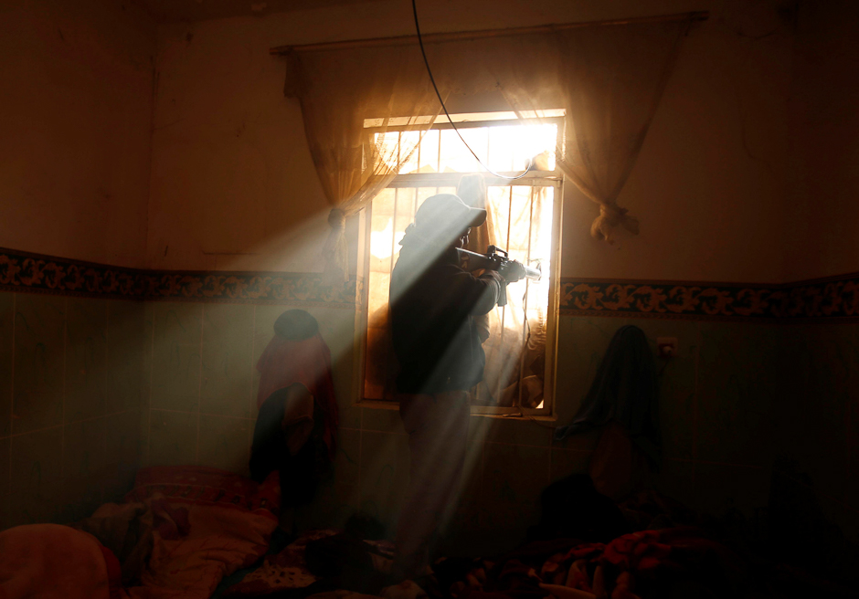 An Iraqi soldier is pictured during an operation against Islamic State militants in the frontline neighbourhood of Intisar, eastern Mosul. PHOTO: REUTERS