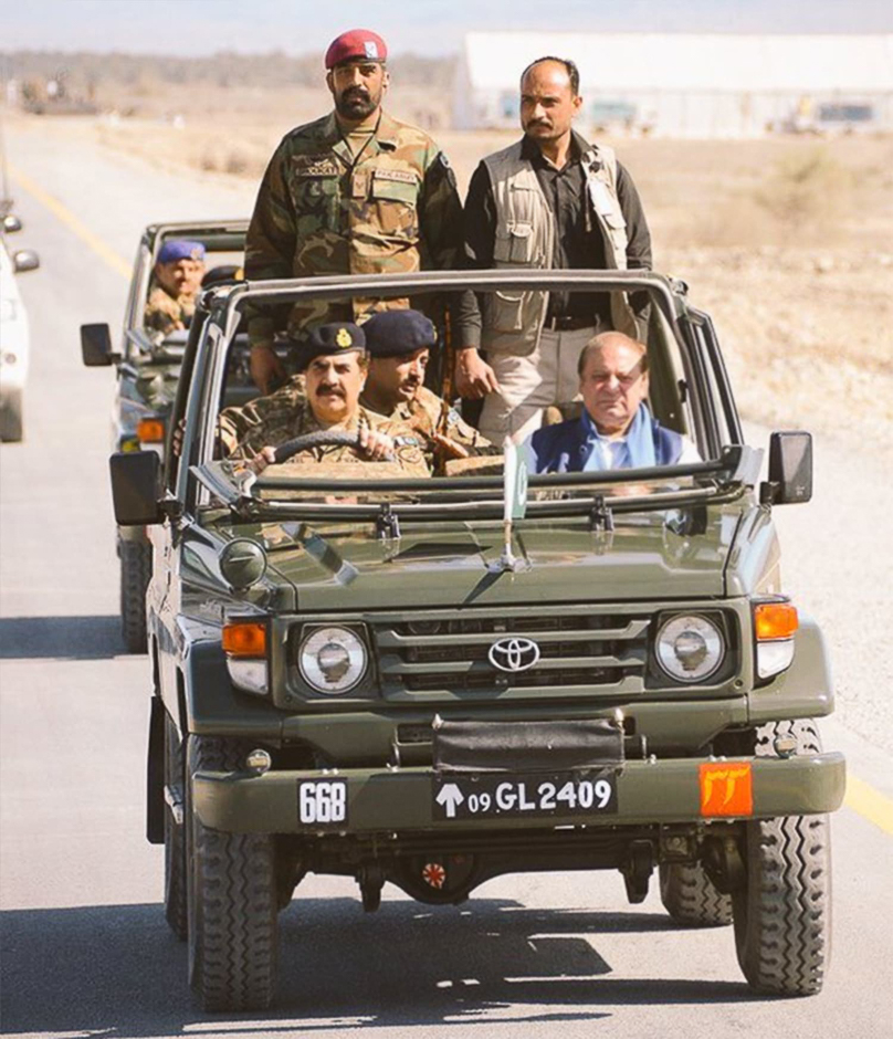 Gen Raheel and PM Nawaz drive along the Gwadar-Hoshab portion of the China Pakistan Economic Corridor. PHOTO: ISPR