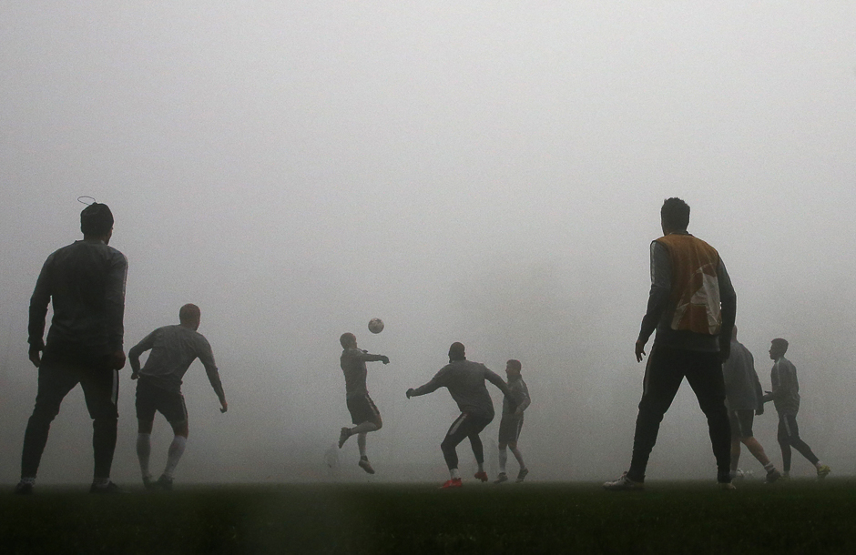 Monaco players train in the fog ahead of their Champions League match against Tottenham. PHOTO: REUTERS