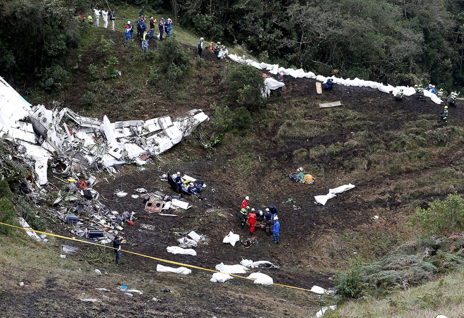 Rescue crew work at the wreckage of a plane that crashed into the Colombian jungle with Brazilian soccer team Chapecoense near Medellin, Colombia. PHOTO: REUTERS