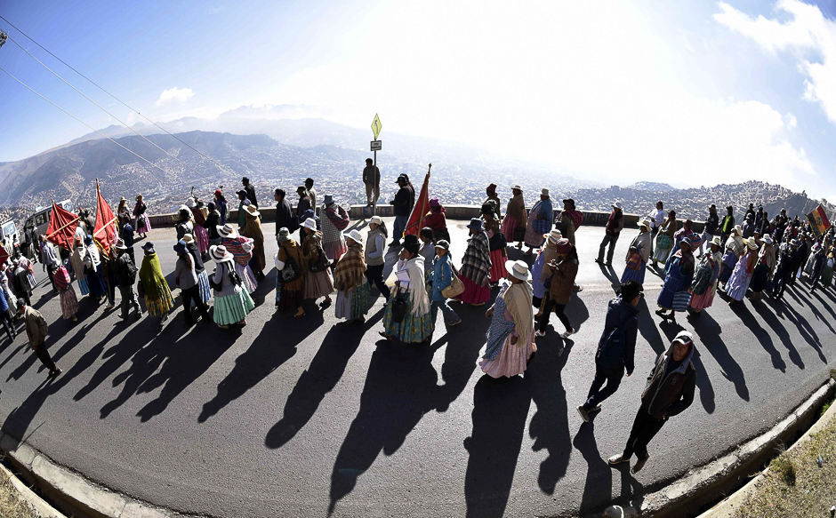 Inhabitants of El Alto march down to La Paz to protest for the shortage of water in both cities in La Paz, Bolivia. PHOTO: AFP