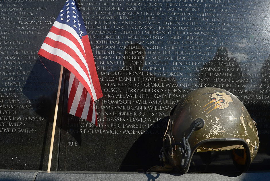 Items are left at the Vietnam Veterans Memorial Wall in Washington DC, on Veterans Day November 11, 2016 in Washington, DC. PHOTO: AFP