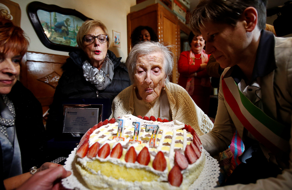 Emma Morano, thought to be the world's oldest person and the last to be born in the 1800s, blows candles during her 117th birthday in Verbania, northern Italy. PHOTO: REUTERS