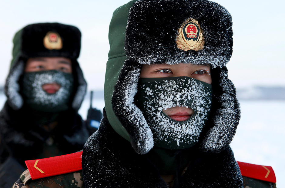Chinese paramilitary police border guards train in the snow at Mohe County in China's northeast Heilongjiang province, on the border with Russia. PHOTO: AFP