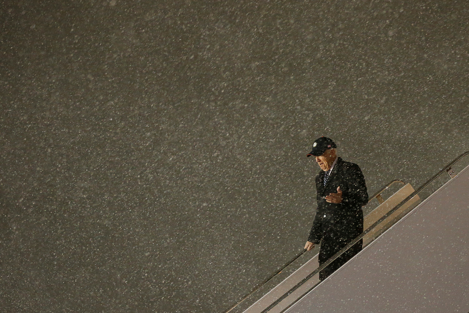 US Vice President Joe Biden steps off his plane in a snow storm upon his arrival at the Ottawa International Airport in Ottawa, Ontario, Canada. PHOTO: REUTERS