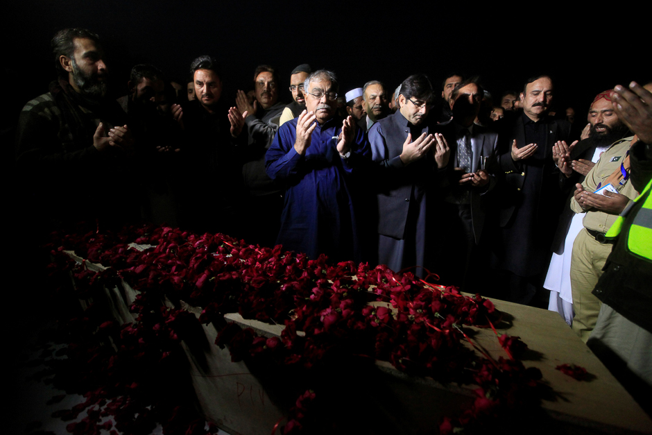 Men attend funeral prayers for the plane crash victims in Islamabad. PHOTO: REUTERS