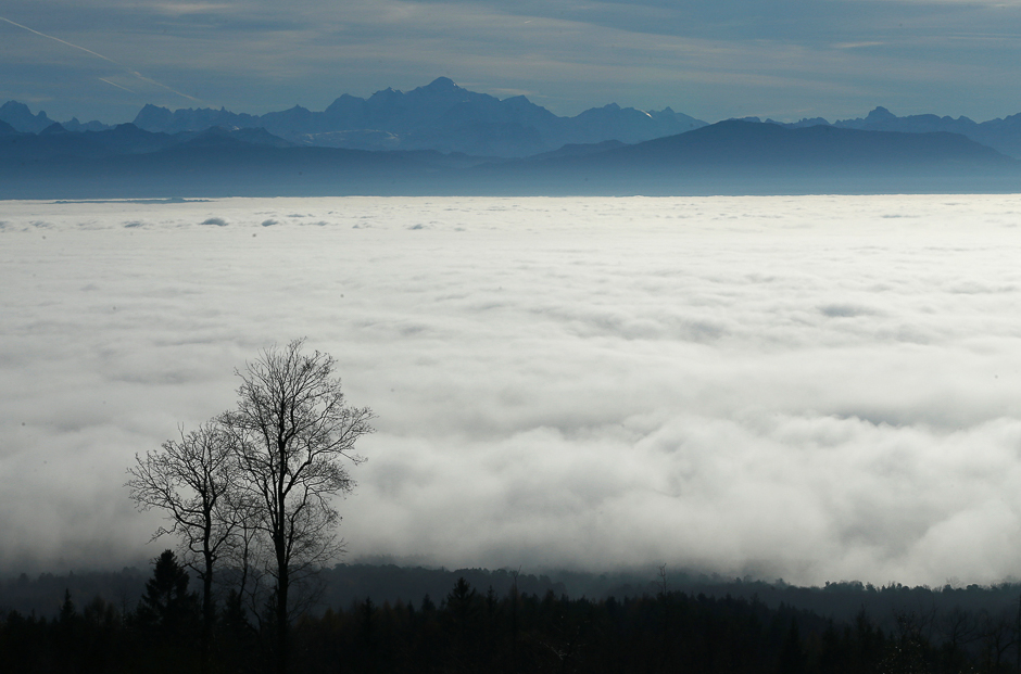 The Mont-Blanc mountain is pictured with a sea of mist on a warm winter day from St-Cergue near Geneva, Switzerland, December 9, 2016. REUTERS/Denis Balibouse