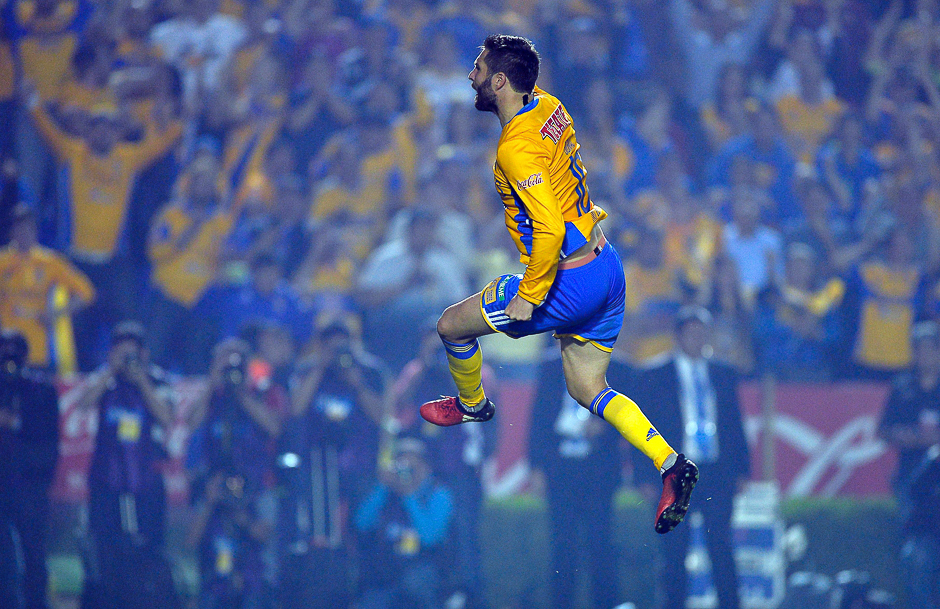 Tigres forward Pierre Andre Gignac celebrates after scoring a penalty shot against America during the Final match of the Apertura 2016 Mexican tournament at the Universitario stadium in Monterrey, Mexico. PHOTO: AFP