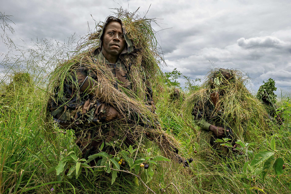 Virunga Park rangers in the Democratic Republic of the Congo undergo military-style training, including ambush tactics, due to the constant threat from armed groups. PHOTO: BRENT STIRTON/NATIONAL GEOGRAPHIC