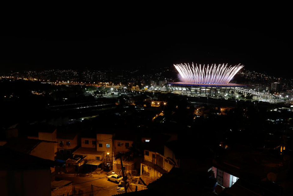 The Maracana Olympic Stadium during the opening ceremony is seen from the Mangueira favela slum during the Rio Olympic Opening Ceremony August 5, 2016. PHOTO: REUTERS