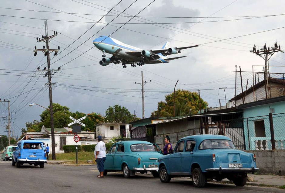 Air Force One carrying US President Barack Obama and his family flies over a neighbourhood of Havana, Cuba, as it approaches the runway to land at Havanaâs international airport, on March 20, 2016. PHOTO: REUTERS