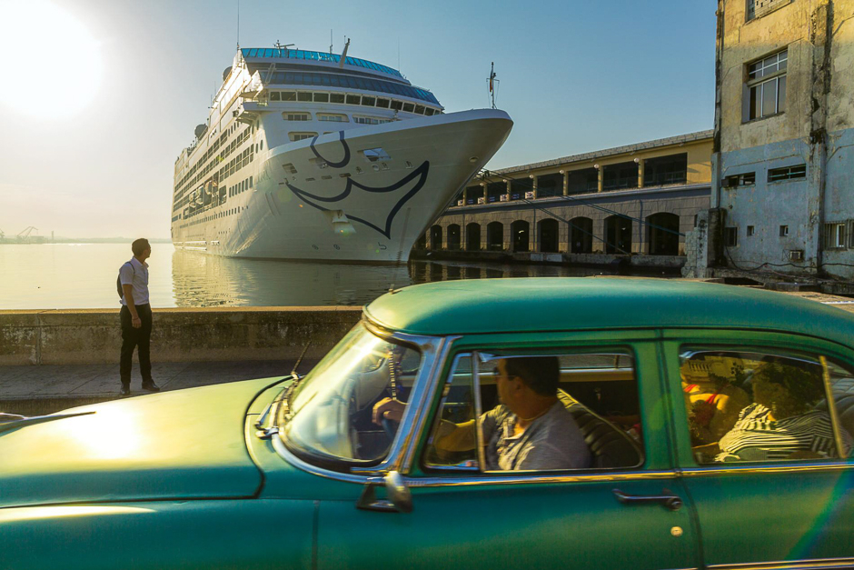A curiosity, a portent, a looming symbol of the impending change: This May, for the first time in nearly four decades, an American cruise ship sailed into Havana Bay. PHOTO: DAVID GUTTENFELDER/NATIONAL GEOGRAPHIC