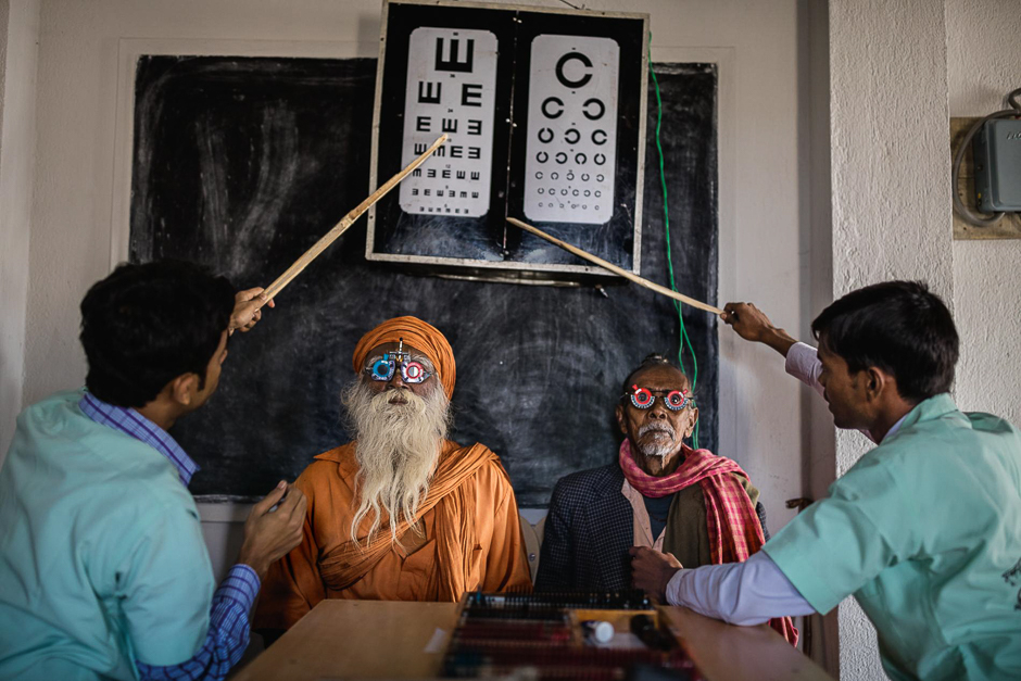 Eye-care workers use test-lens frames to conduct eye exams in Indiaâs Sundarbans region. Their goal: to help reduce Indiaâs blind population of more than eight million. PHOTO: BRENT STIRTON/NATIONAL GEOGRAPHIC