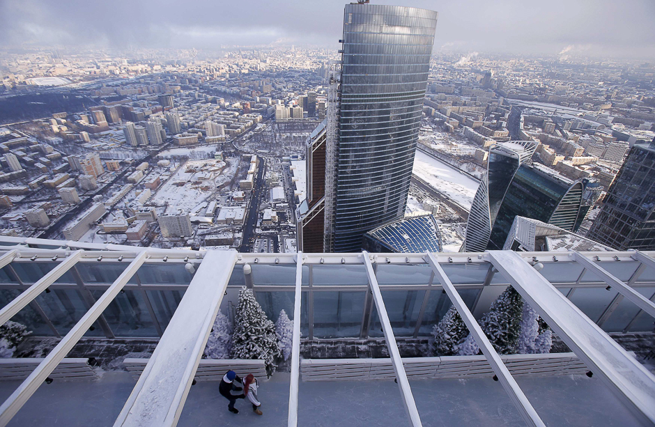 People skate during the opening of an ice rink on the roof of the skyscraper OKO, one of the towers of the Moscow International Business Centre, in Moscow, Russia. PHOTO: REUTERS