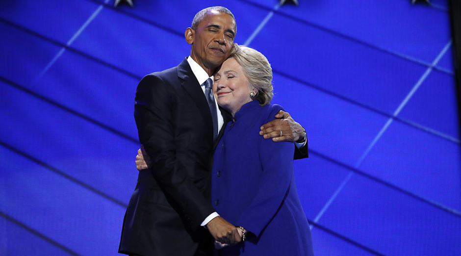 Democratic presidential nominee Hillary Clinton hugs US President Barack Obama as she arrives onstage at the end of his speech on the third night of the 2016 Democratic National Convention in Philadelphia, Pennsylvania, US, July 27, 2016. PHOTO: REUTERS