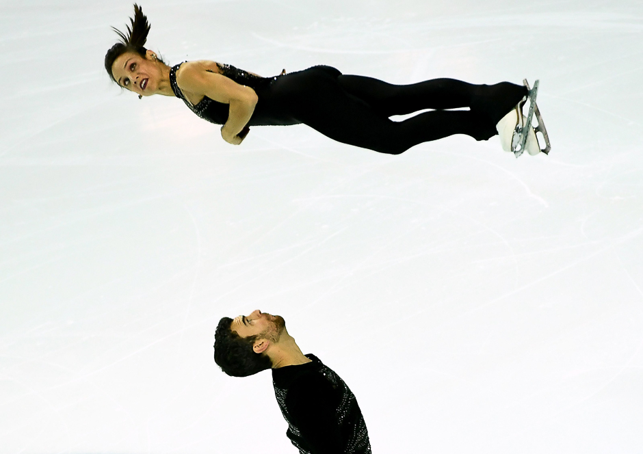 Canadian's Meagan Duhamel and Eric Radford compete in the senior pair short program at the ISU Grand Prix of Figure Skating Final in Marseille, southern France. PHOTO: AFP