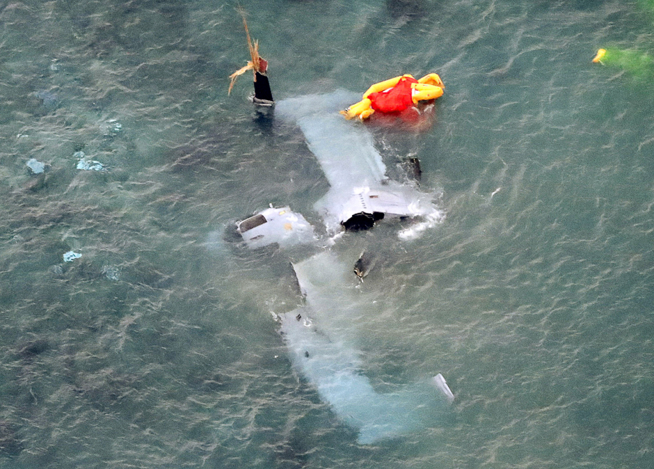 A wrecked US Marine Corps MV-22 Osprey aircraft that crash-landed in the sea off Nago is seen in Okinawa Prefecture, Japan. PHOTO: REUTERS