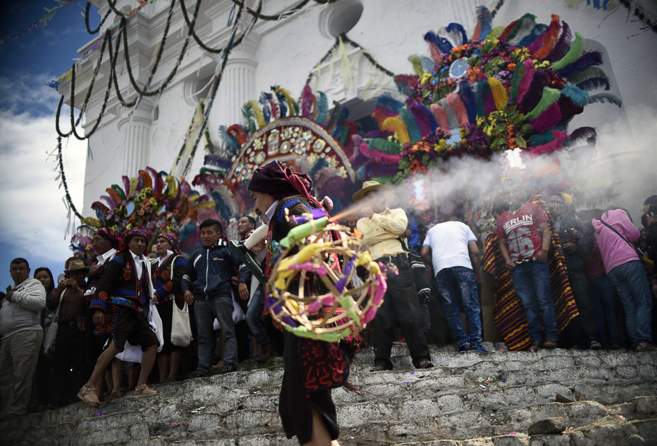 A member of the Santo Tomas brotherhood takes part in the procession in honour of the saint in Chichicastenango municipality, Quiche department, 150 kilometres west of Guatemala City. PHOTO: AFP
