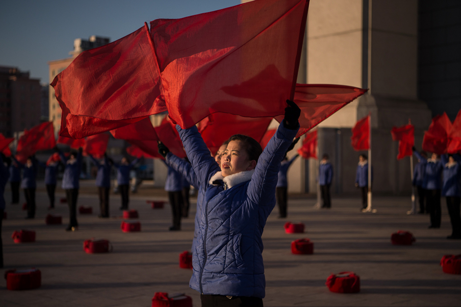 A propaganda troupe performs before the Arch of Triumph on the last day of the 200-day campaign in Pyongyang. PHOTO: AFP