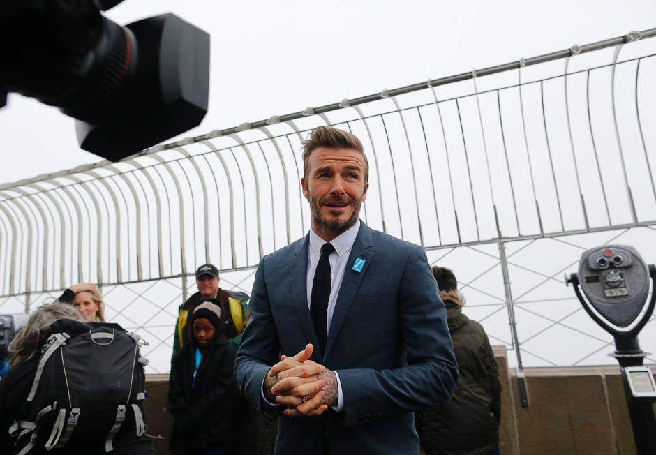 UNICEF Goodwill Ambassador and former professional footballer David Beckham attends a lighting ceremony at the Empire State Building in New York to mark UNICEFs 70th anniversary. PHOTO: AFP