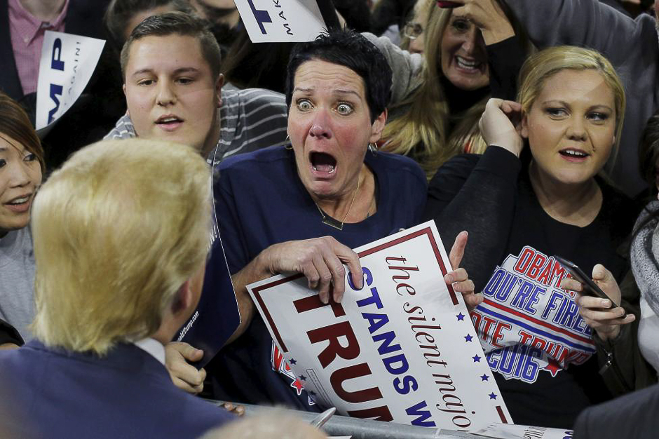 Audience member Robin Roy (C) reacts as Donald Trump greets her at a campaign rally in Lowell, Massachusetts January 4, 2016. PHOTO: REUTERS