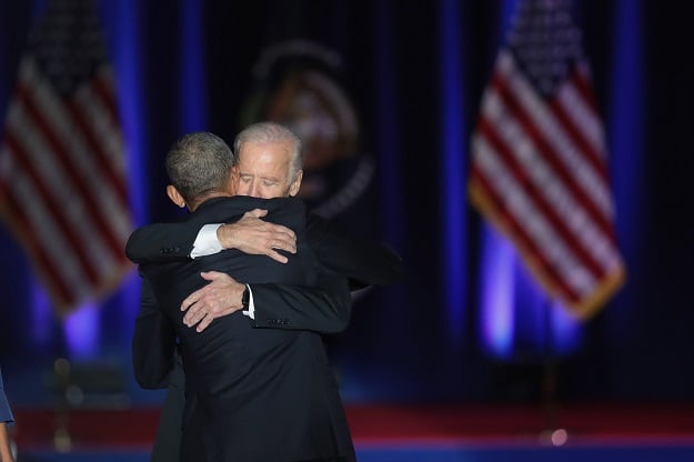 President Barack Obama embraces Vice President Joe Biden after Obama delivered his farewell speech to the nation on January 10, 2017 in Chicago, Illinois. President-elect Donald Trump will be sworn in the as the 45th president on January 20. PHOTO:AFP
