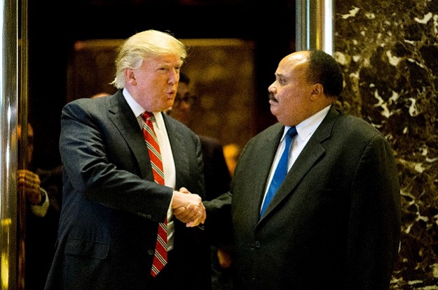 US President-elect Donald Trump shakes hands with Martin Luther King III after a meeting at Trump Tower in New York City. PHOTO: AFP 