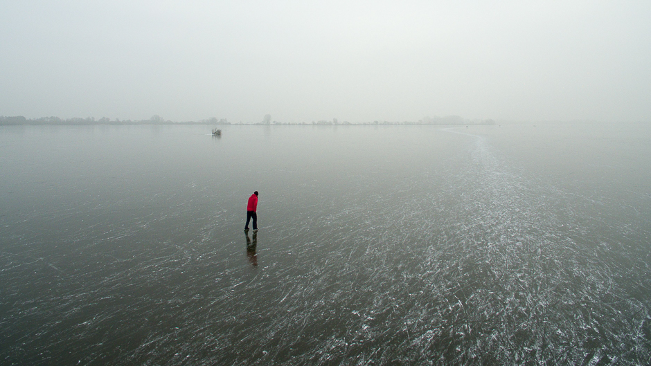 A ice-skater skates on the ice surface of the Duemmer lake near Damme, northern Germany. PHOTO: AFP