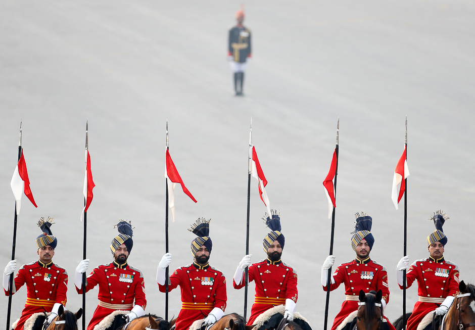 The Indian President's bodyguards, mounted on their horses, take part in the Beating the Retreat ceremony in New Delhi, India. PHOTO: REUTERS