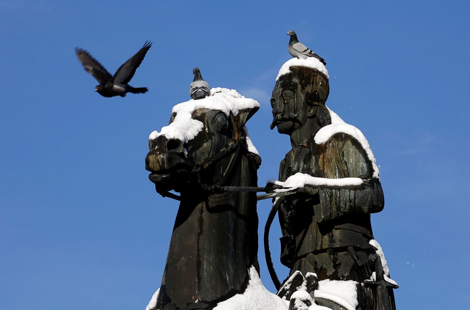 Pigeons perch on the statue of Greek Independence war hero Georgios Karaiskakis following a rare snowfall, in Athens, Greece. PHOTO: REUTERS