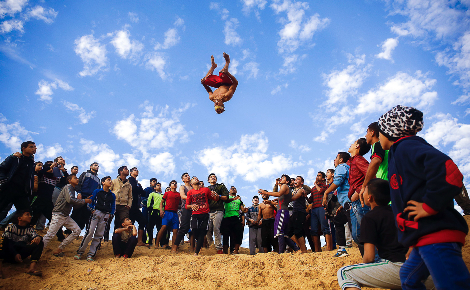 Palestinian youths from Gaza's Free Parkour team practice their parkour skills in Gaza City. PHOTO: AFP