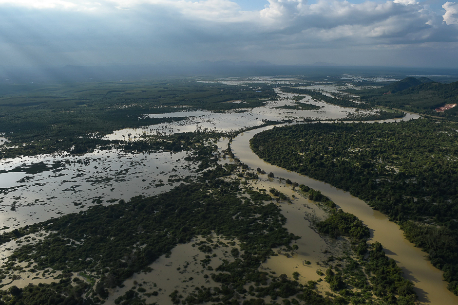 This picture shows an aerial view of overflowing rivers and canals in Thailand's southern province of Surat Thani. PHOTO: AFP