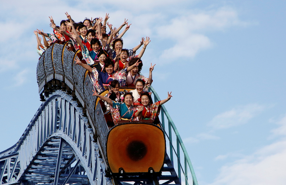 Japanese women wearing kimonos ride a roller coaster during their Coming of Age Day celebration ceremony at an amusement park in Tokyo, Japan. PHOTO: REUTERS