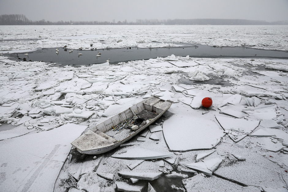 A small boat trapped in the frozen Danube river is seen in Belgrade, Serbia. PHOTO: REUTERS