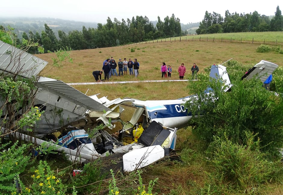 A light aircraft is seen after crashing on the outskirts of Tirua city, south of Chile, killing 4 people onboard, according to local media reports. PHOTO: REUTERS