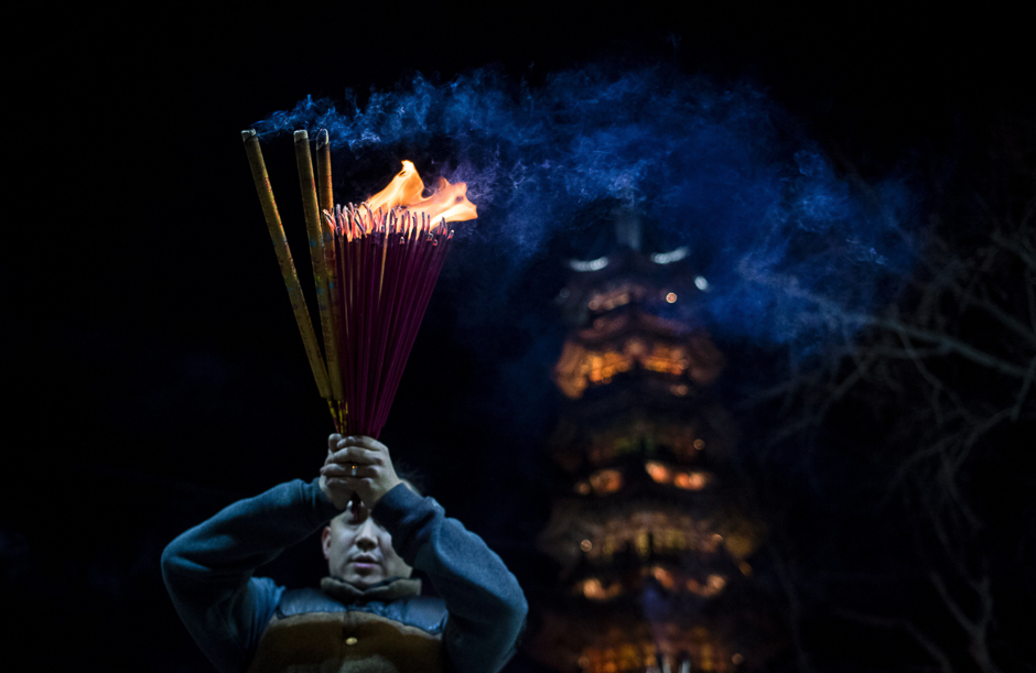 1.incence sticks at the Longhua temple in Shanghai. PHOTO: AFP