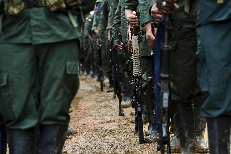 Members of the Revolutionary Armed Forces of Colombia (FARC) guerrillas are seen at the 