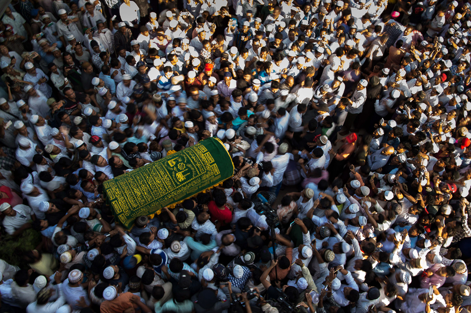 Mourners carry the coffin of Ko Ni, prominent Muslim lawyer who was shot dead on January 29, at the Muslim cemetery in Yangon. PHOTO: AFP