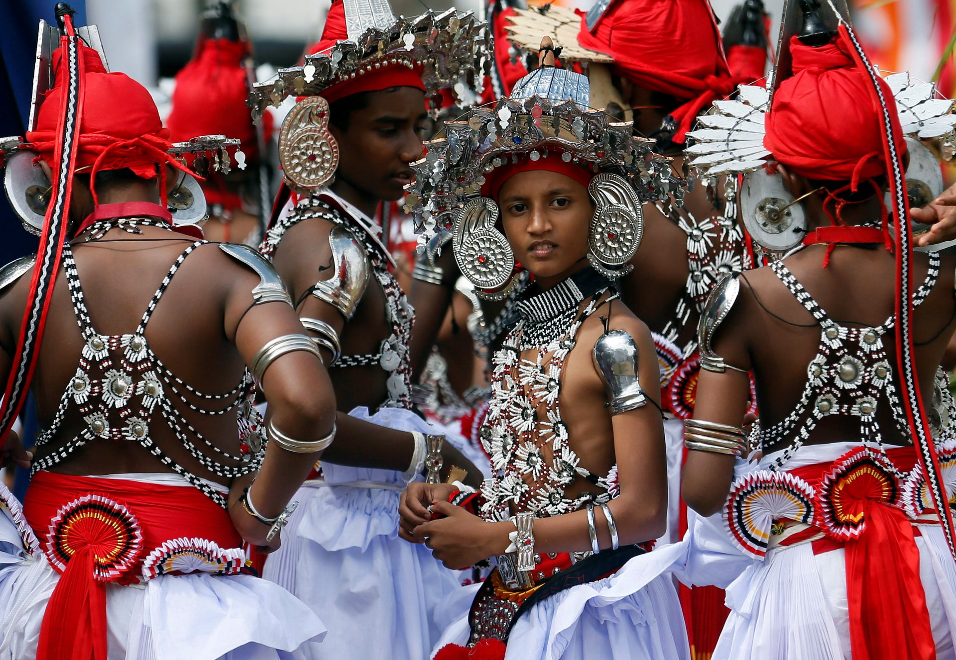 Schoolboys who attend traditional dance classes prepare for their graduation ceremony at a Buddhist temple in the capital city, Colombo, Sri Lanka. PHOTO: REUTERS