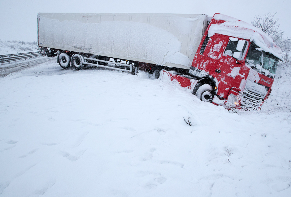 A truck is pictured in the road trench of the A14 highway near Cambs in Mecklenburg-West Pomerania, northern Germany. PHOTO: AFP