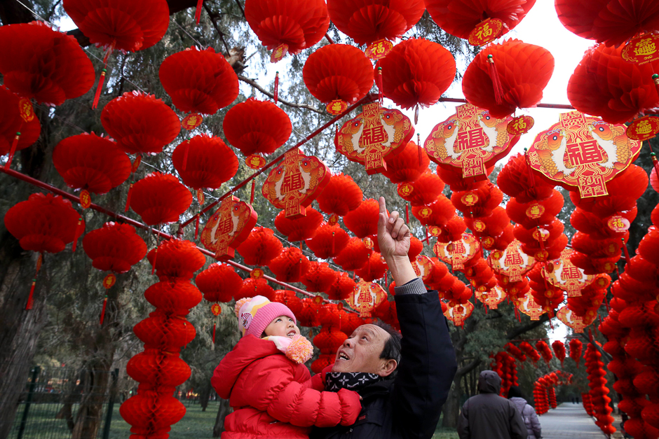 Chinese people visit a lantern display for the upcoming Lunar New Year at a park in Beijing. PHOTO: AFP