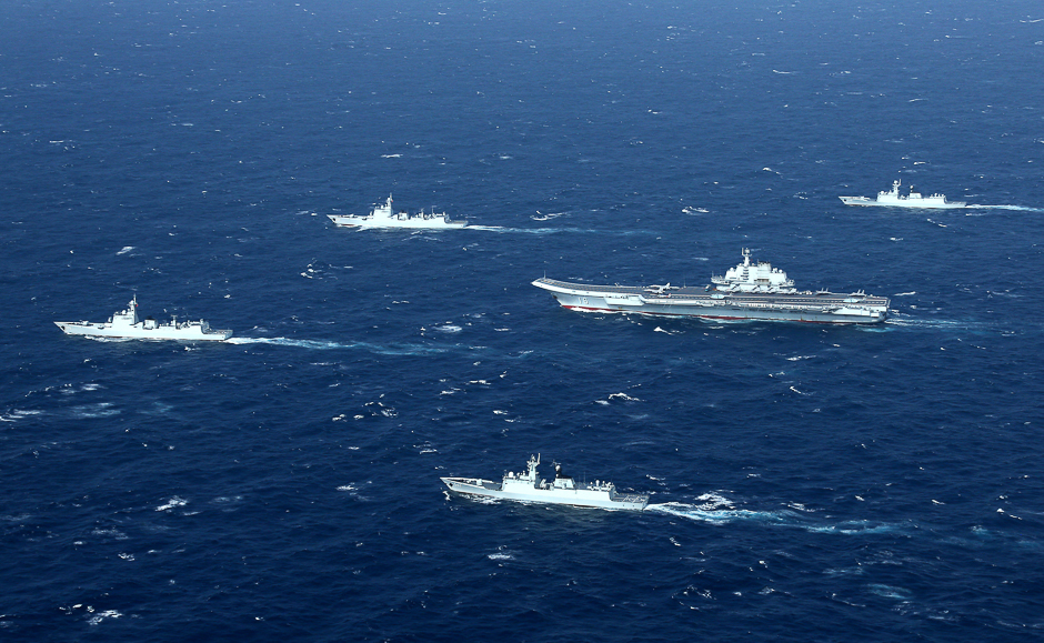 China's Liaoning aircraft carrier with accompanying fleet conducts a drill in an area of South China Sea in this undated photo taken December 2016. PHOTO: REUTERS