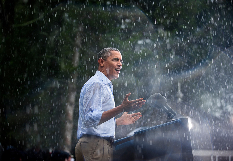 Obama speaks in the rain at a campaign rally in Glen Allen, Virginia. PHOTO: BROOKS KRAFT/CORBIS