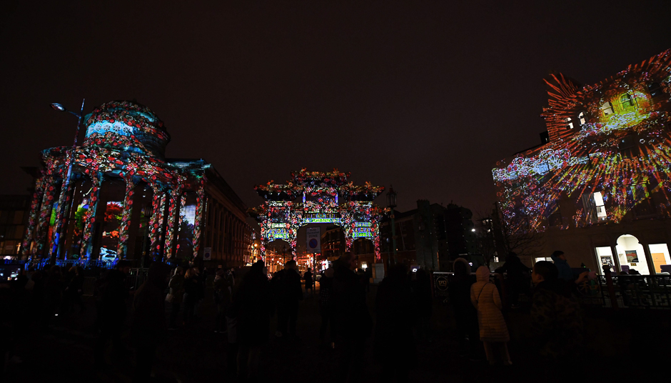 A light show illuminates the Chinese Arch and surrounding buildings in Liverpool, north west England. PHOTO: AFP